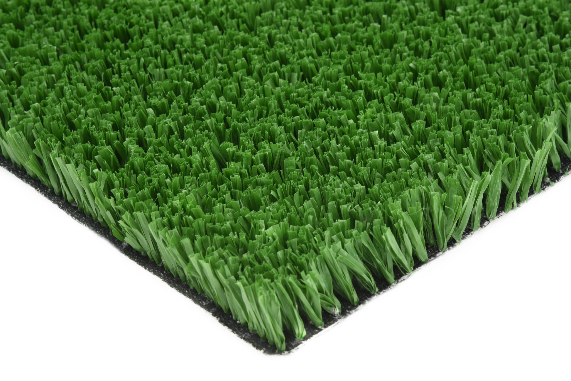 Slitstarkt konstgräs för lek och multisport från Svea Grass, visar en mjuk, grön yta för utomhusaktiviteter och lek.